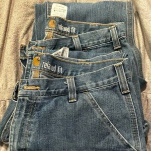 Carhartt, Relaxed fit, men's 34x30 utility jeans (2 pairs selling as a set)
